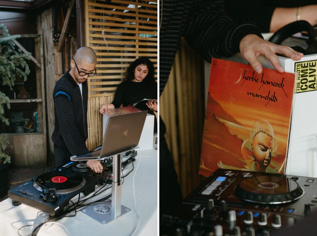A DJ spinning records during a wedding day at Roberta's Pizza in Williamsburg, Brooklyn NYC. 
