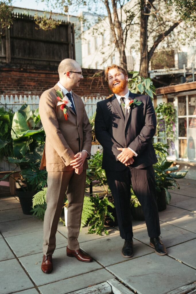 The groom and his best man during a wedding day at Roberta's Pizza in Williamsburg, Brooklyn NYC. 