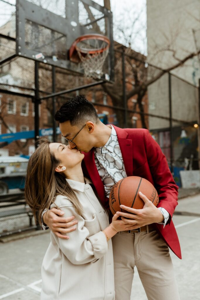 soho NYC engagement photos on a basketball court