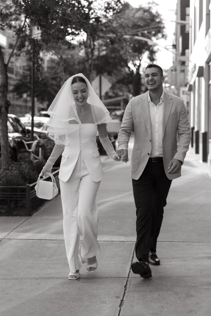 couple walking on road during elopement